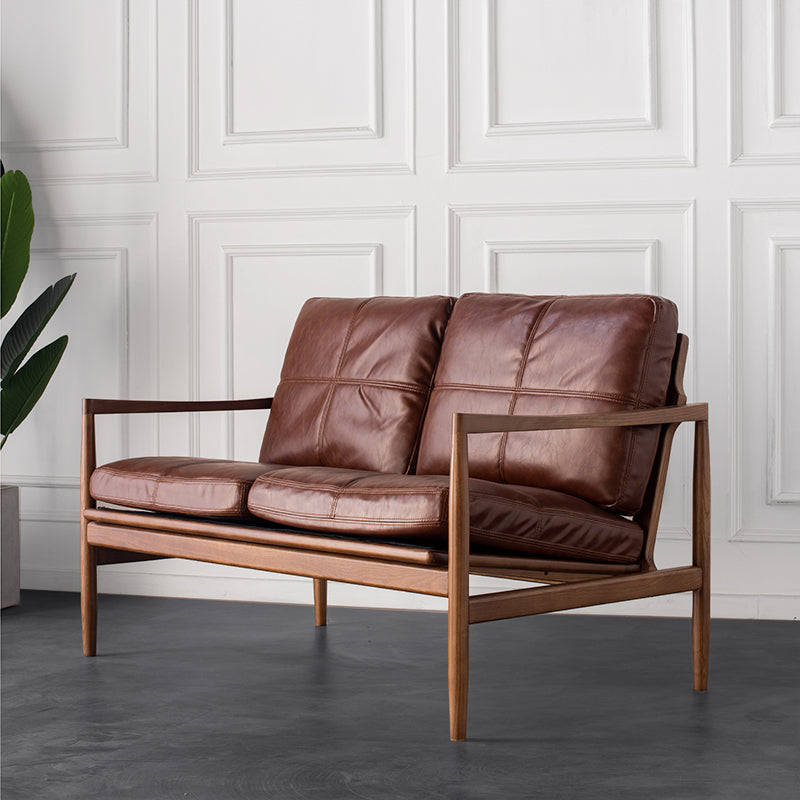 Brown leather armchair for commercial lounges